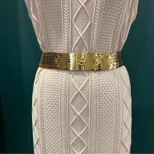 Vintage Stretch Gold belt. Articulated fish scale pattern hold metal flower belt